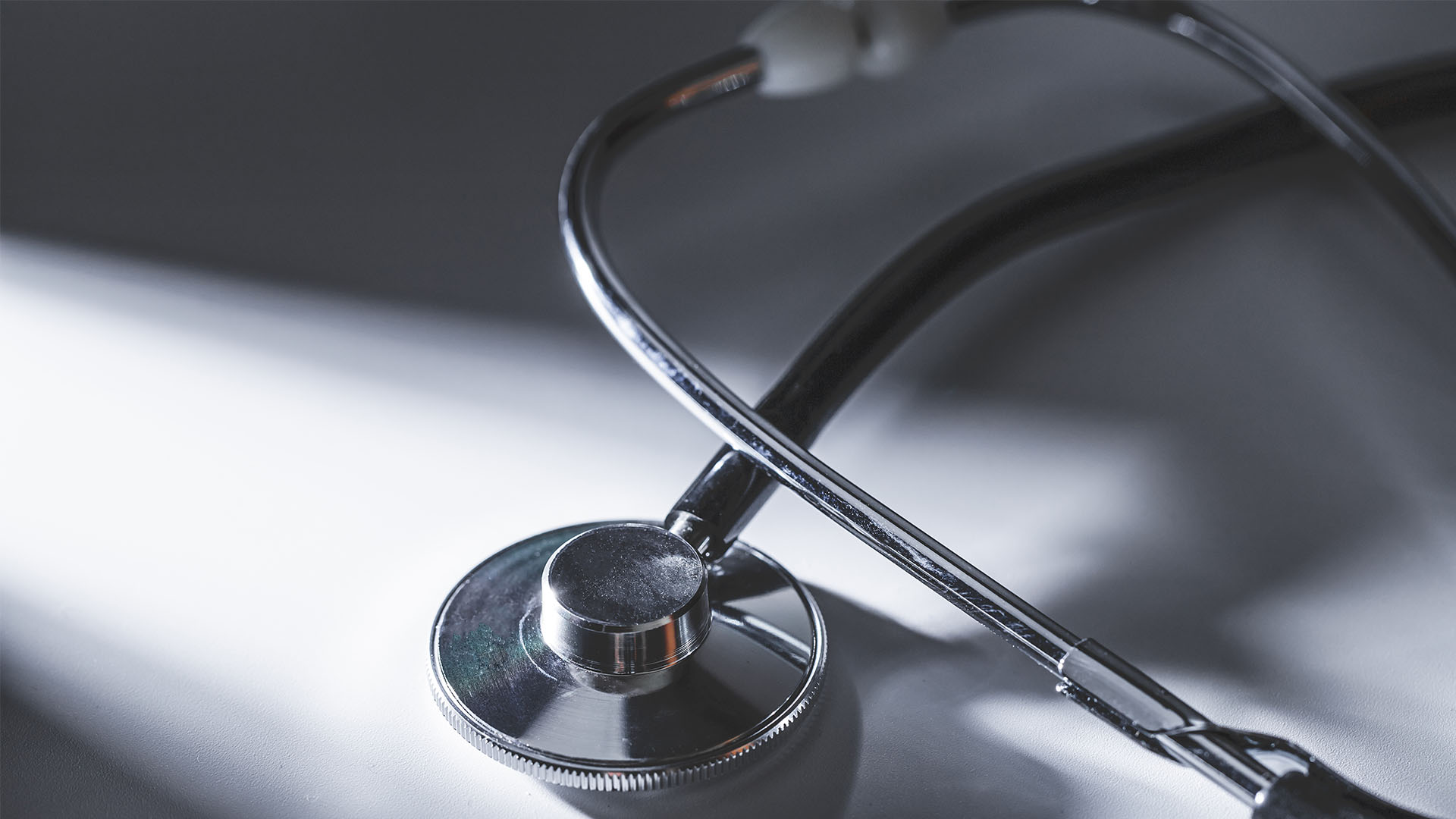 close up of stethoscope isolated with long shadows