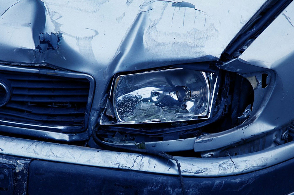 close up of damaged vehicle headlight