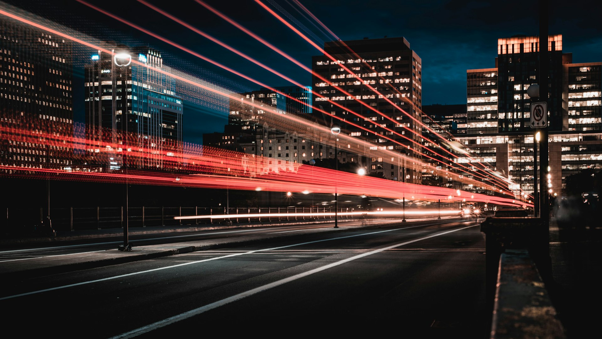 Car headlights on a road at night