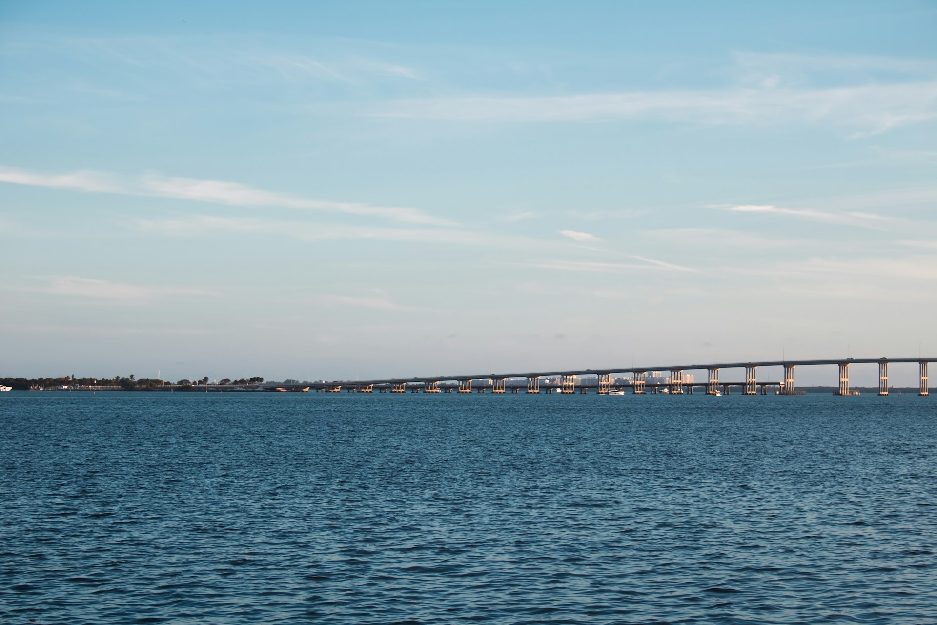 Causeway bridge over calm water