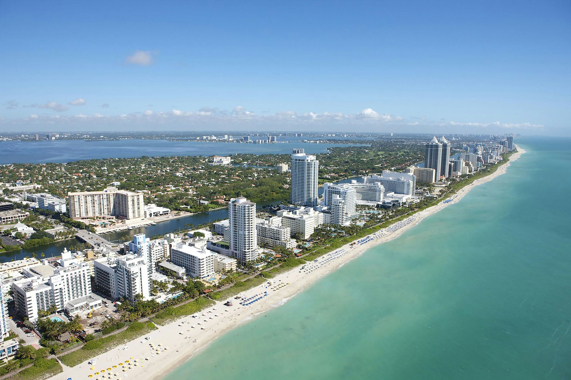 Aerial view of the coastline and high-rises in north Miami-Dade