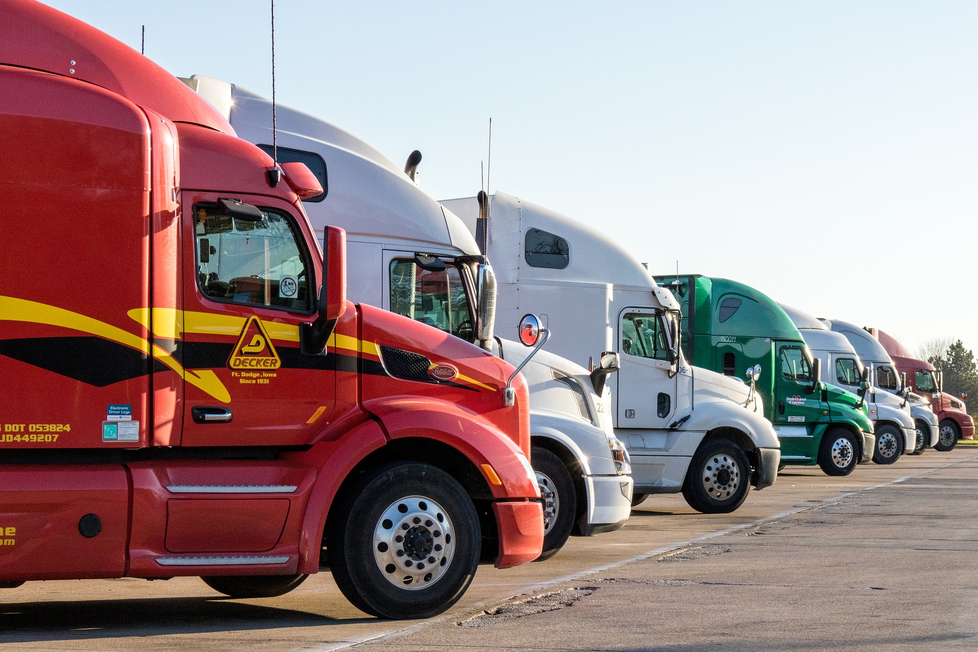 semi-trucks parked next to each other